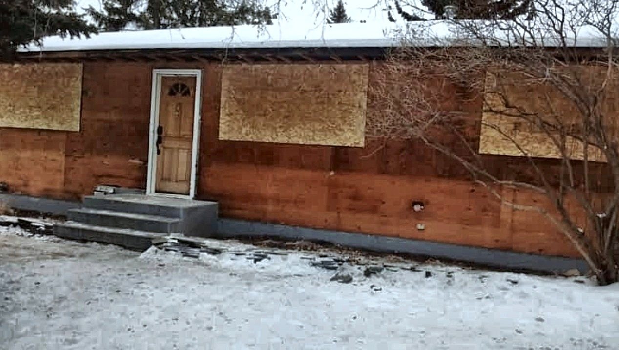 Exterior cladding stripped from a house